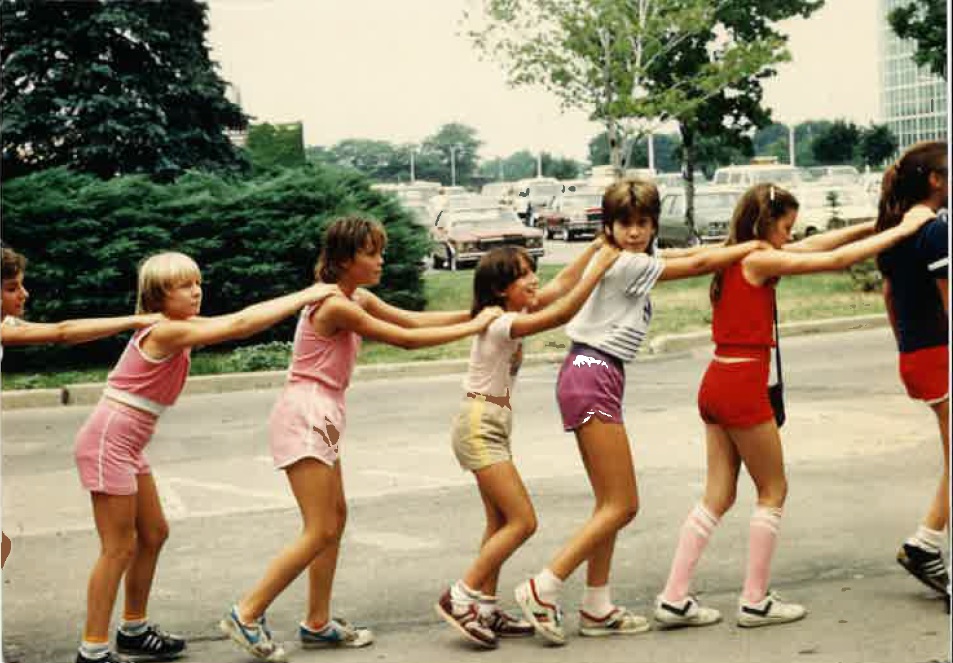 Vintage photo of children playing outdoors during Niagara Falls Boys & Girls Club summer activities.